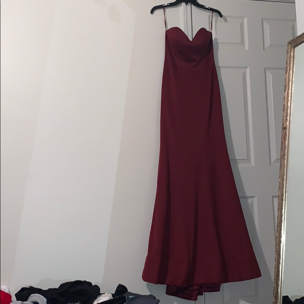 A long burgundy mermaid dress! Only worn once!